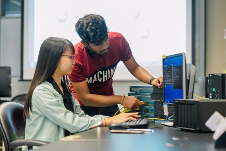 Students working on network design and setup.jpg